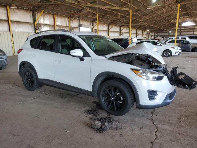 Photo 4 from auction – 2016 MAZDA CX-5 SPORT with VIN JM3KE2BY0G0638419