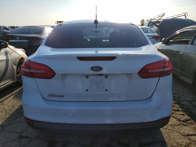 Photo 6 from auction – 2015 FORD FOCUS SE with VIN 1FADP3F20FL325669