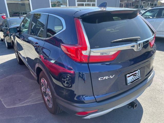 Photo 3 from auction – 2018 HONDA CR-V EX with VIN 7FARW2H57JE008895