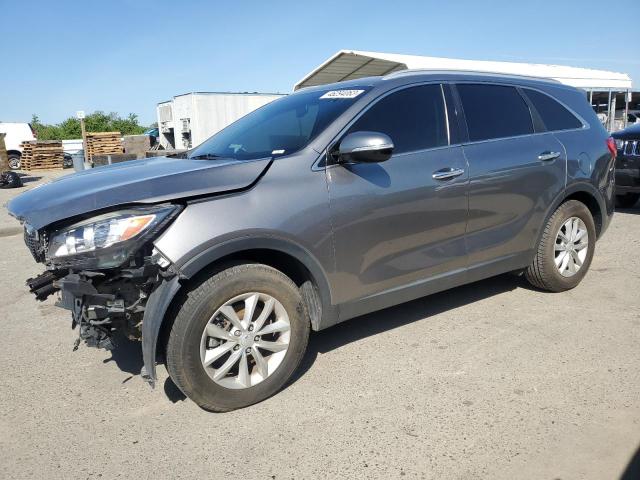 KIA SORENTO LX 2016 with VIN 5XYPG4A31GG157809 - Photo from auction
