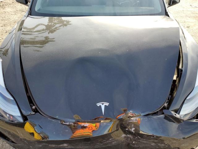 Photo 11 from auction – 2021 TESLA MODEL 3 with VIN 5YJ3E1EA2MF028377