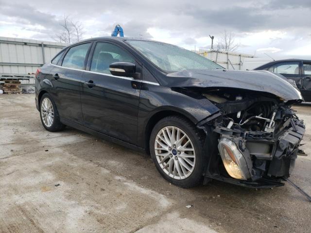 Photo 4 from auction – 2014 FORD FOCUS TITA with VIN 1FADP3J2XEL450460