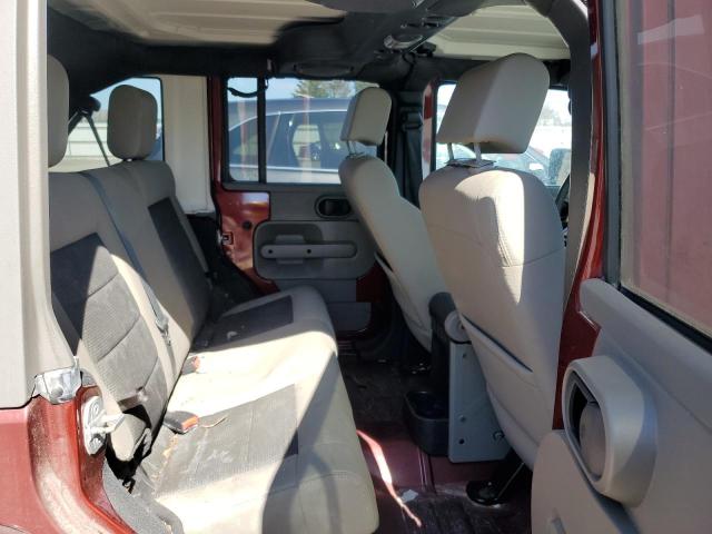 Photo 11 from auction – 2010 JEEP WRANGLER U with VIN 1J4BA5H19AL141577