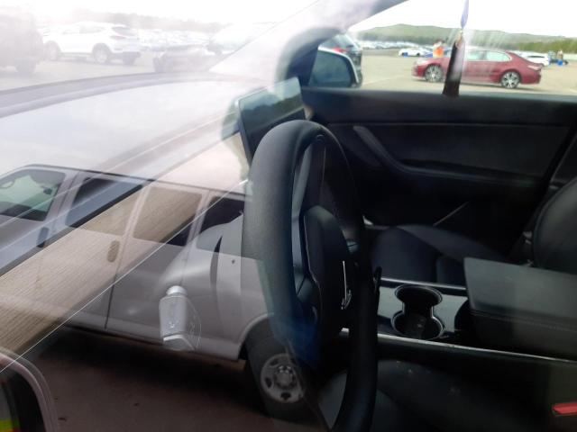 Photo 9 from auction – 2021 TESLA MODEL Y with VIN 5YJYGDEE4MF118571