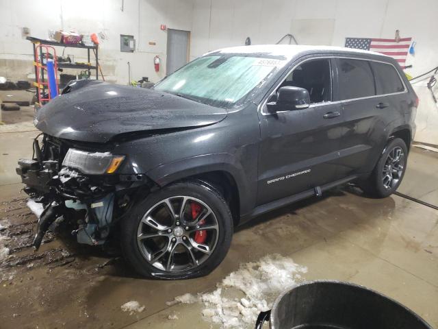 JEEP GRAND CHER 2014 with VIN 1C4RJFDJ9EC306601 - Photo from auction