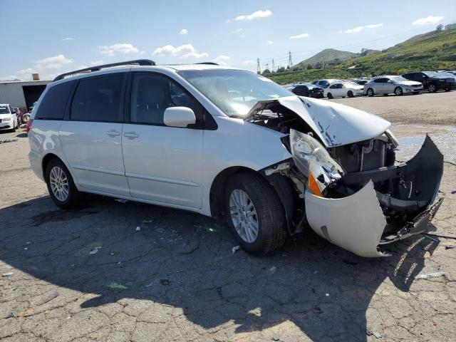 Photo 4 from auction – 2010 TOYOTA SIENNA XLE with VIN 5TDYK4CC7AS293422