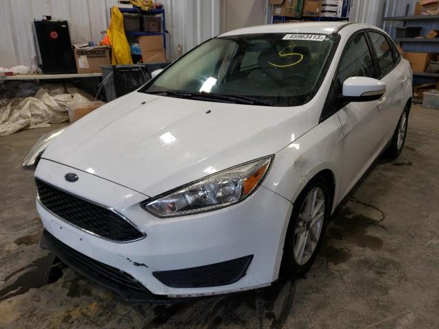 FORD FOCUS SE 2017 with VIN 1FADP3F26HL287027 - Photo from auction