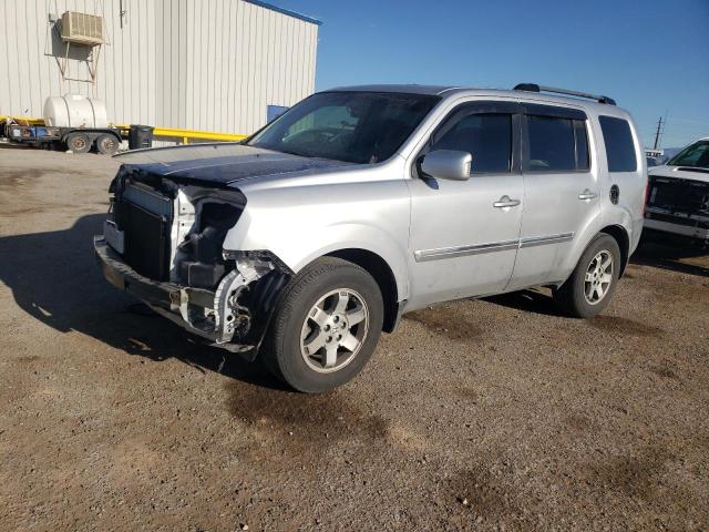 HONDA PILOT TOUR 2011 with VIN 5FNYF3H98BB045083 - Photo from auction