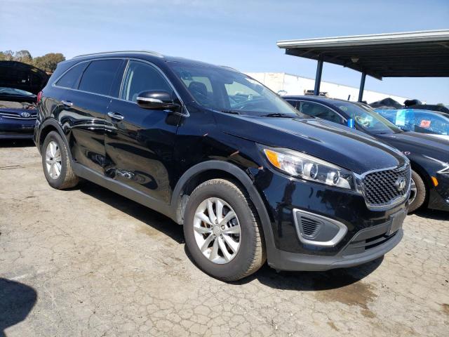 Photo 4 from auction – 2016 KIA SORENTO LX with VIN 5XYPG4A37GG060663