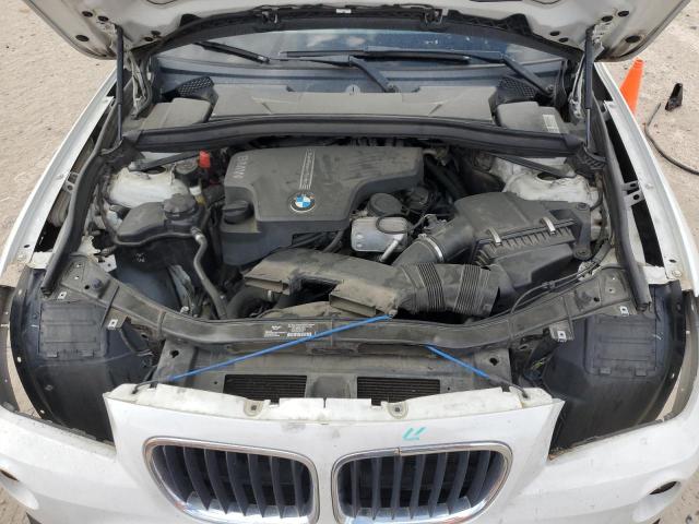 Photo 11 from auction – 2014 BMW X1 SDRIVE2 with VIN WBAVM1C5XEVW48704