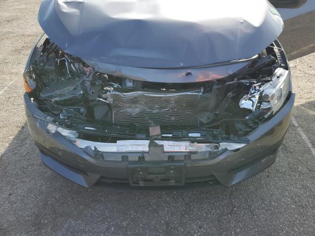 Photo 11 from auction – 2017 HONDA CIVIC LX with VIN 2HGFC2F50HH566300