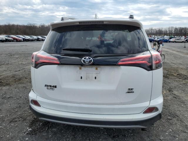 Photo 6 from auction – 2018 TOYOTA RAV4 SE with VIN JTMJFREV4JD234535