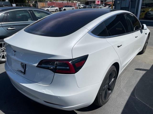 Photo 4 from auction – 2018 TESLA MODEL 3 with VIN 5YJ3E1EA0JF014800
