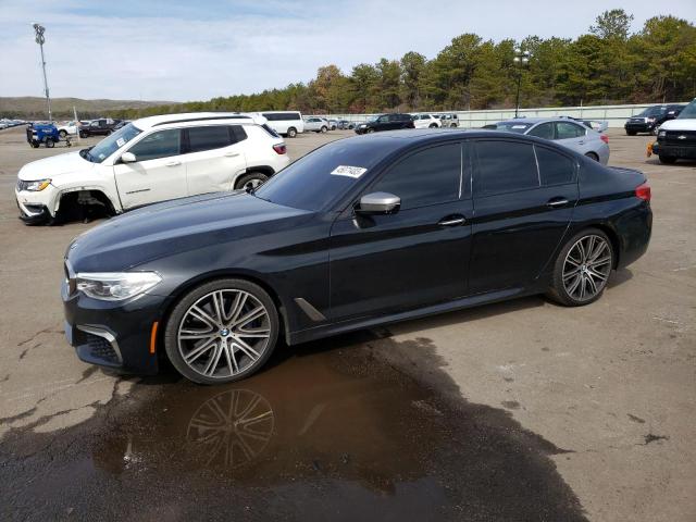 BMW M550XI 2018 with VIN WBAJB9C57JG463799 - Photo from auction