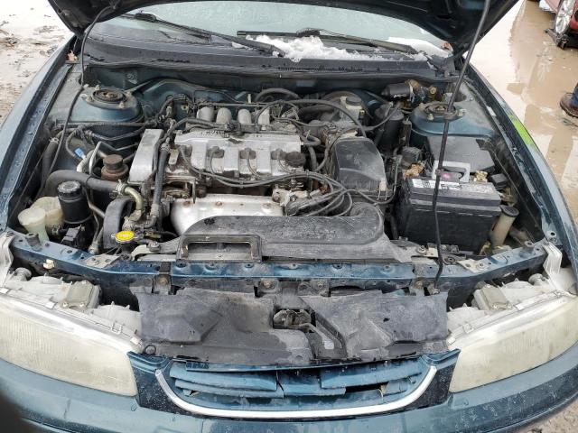Photo 11 from auction – 1997 MAZDA 626 DX with VIN 1YVGE22C2V5616810