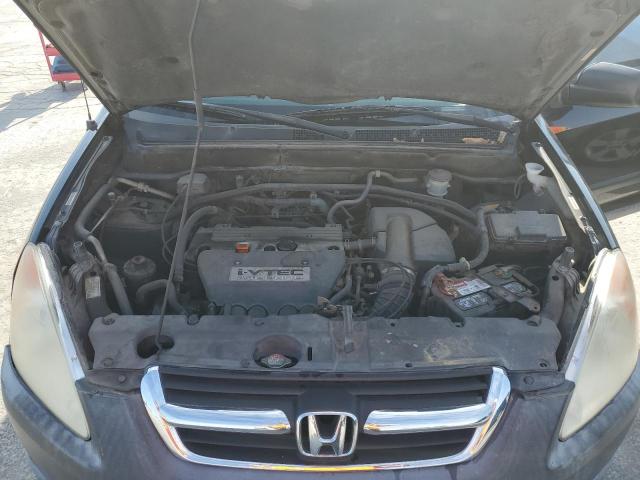 Photo 12 from auction – 2002 HONDA CR-V LX with VIN JHLRD68452C026023
