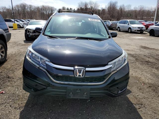 Photo 5 from auction – 2016 HONDA CR-V LX with VIN 2HKRM4H30GH668752