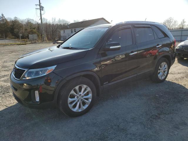 KIA SORENTO EX 2014 with VIN 5XYKUDA79EG430806 - Photo from auction