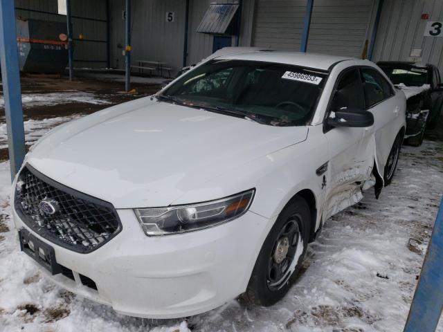 FORD TAURUS POL 2015 with VIN 1FAHP2MK0FG163663 - Photo from auction