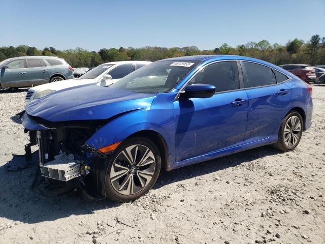 HONDA CIVIC EXL 2018 with VIN JHMFC1F71JX027016 - Photo from auction