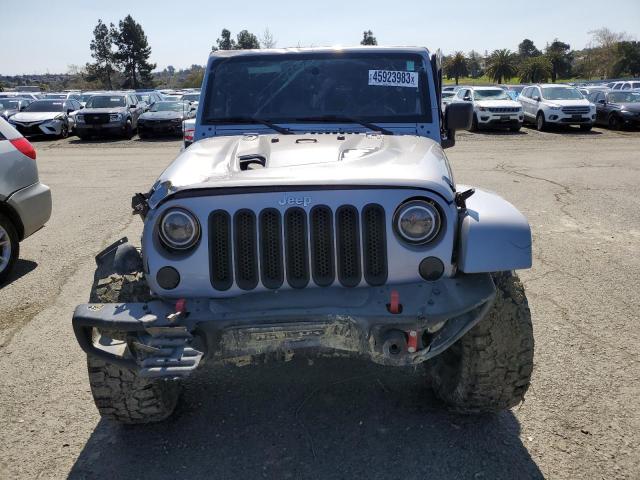 Photo 5 from auction – 2016 JEEP WRANGLER U with VIN 1C4BJWFG0GL264809