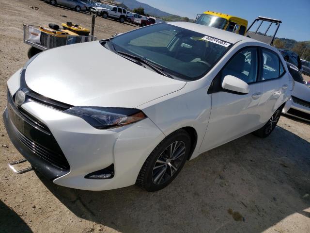 TOYOTA COROLLA L 2017 with VIN 5YFBURHE8HP593304 - Photo from auction