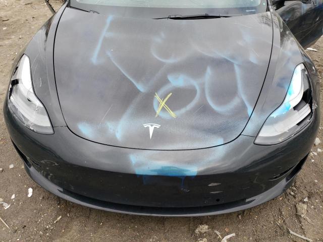 Photo 11 from auction – 2022 TESLA MODEL 3 with VIN 5YJ3E1EB7NF105612