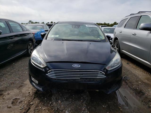 Photo 5 from auction – 2016 FORD FOCUS TITA with VIN 1FADP3J25GL260049