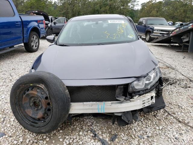 Photo 5 from auction – 2018 HONDA CIVIC LX with VIN 19XFC2F55JE034279