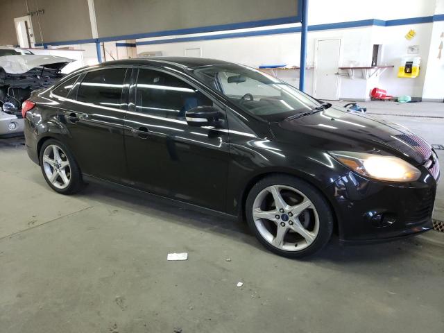 Photo 4 from auction – 2014 FORD FOCUS TITA with VIN 1FADP3J29EL391949
