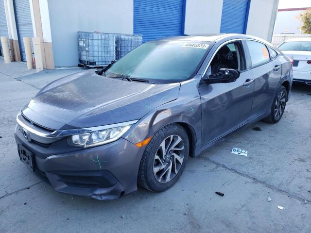 HONDA CIVIC EX 2017 with VIN 19XFC2F70HE220081 - Photo from auction