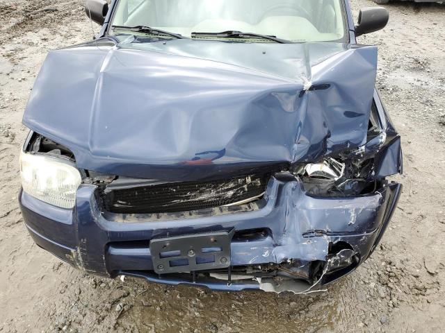 Photo 12 from auction – 2003 FORD ESCAPE LIM with VIN 1FMCU94163KA06527