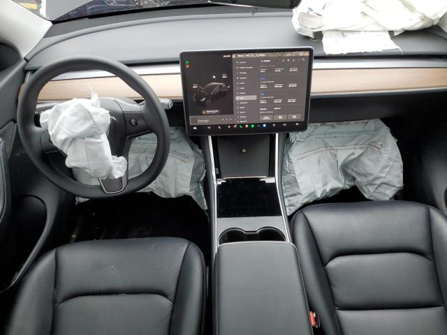 Photo 8 from auction – 2021 TESLA MODEL Y with VIN 5YJYGDEF4MF088948