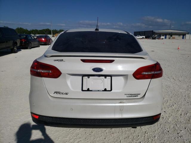 Photo 6 from auction – 2016 FORD FOCUS TITA with VIN 1FADP3J29GL381909