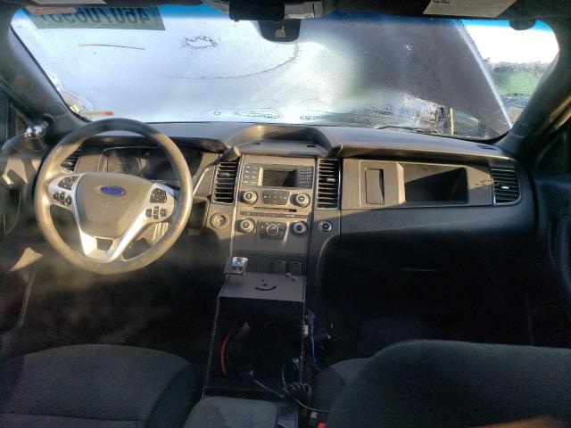 Photo 8 from auction – 2014 FORD TAURUS POL with VIN 1FAHP2MK3EG122393