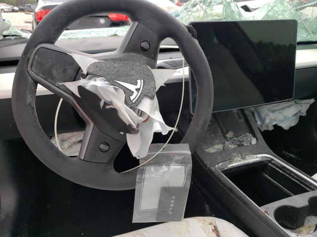 Photo 9 from auction – 2023 TESLA MODEL 3 with VIN 5YJ3E1EA8PF426696