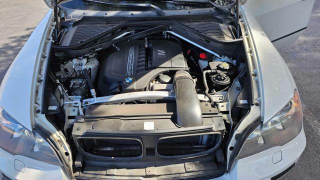 Photo 7 from auction – 2012 BMW X5 XDRIVE3 with VIN 5UXZV4C54CL766368