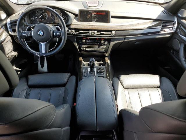 Photo 8 from auction – 2014 BMW X5 XDRIVE5 with VIN 5UXKR6C56E0J71883