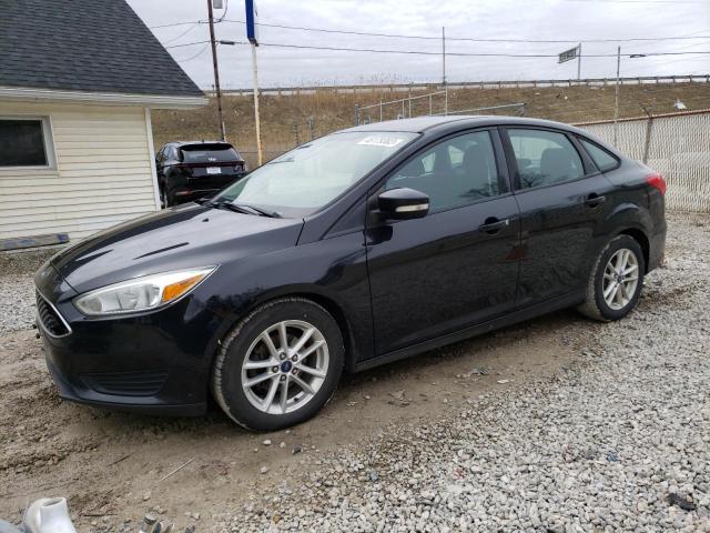 FORD FOCUS SE 2015 with VIN 1FADP3F21FL329228 - Photo from auction