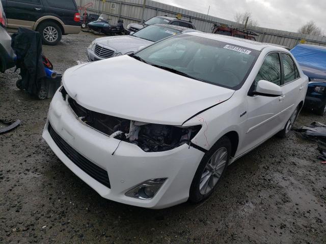 TOYOTA CAMRY HYBR 2014 with VIN 4T1BD1FK4EU119791 - Photo from auction