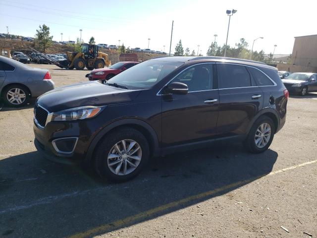 KIA SORENTO LX 2016 with VIN 5XYPG4A35GG010568 - Photo from auction