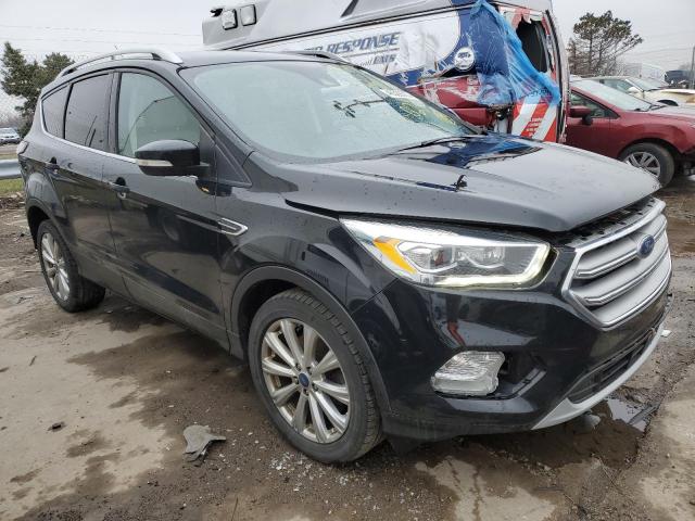 Photo 4 from auction – 2017 FORD ESCAPE TIT with VIN 1FMCU9JDXHUC90254