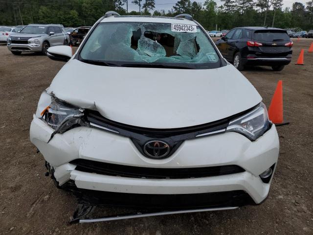 Photo 5 from auction – 2018 TOYOTA RAV4 LIMIT with VIN JTMYFREV0JJ736362