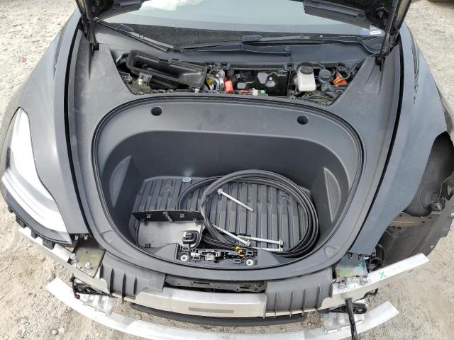 Photo 11 from auction – 2022 TESLA MODEL 3 with VIN 5YJ3E1EB3NF187466