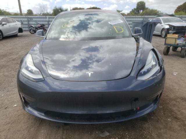 Photo 5 from auction – 2018 TESLA MODEL 3 with VIN 5YJ3E1EA3JF052800