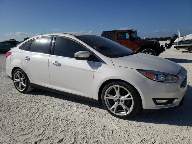 Photo 4 from auction – 2016 FORD FOCUS TITA with VIN 1FADP3J29GL381909