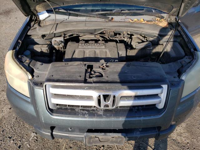 Photo 11 from auction – 2006 HONDA PILOT EX with VIN 2HKYF185X6H508771