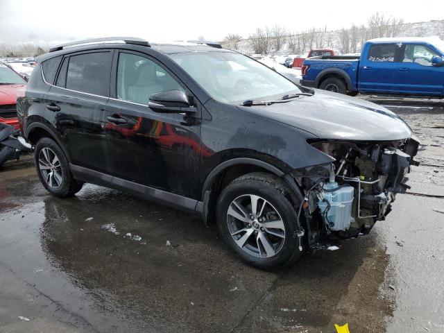 Photo 4 from auction – 2016 TOYOTA RAV4 XLE with VIN 2T3RFREV8GW504221