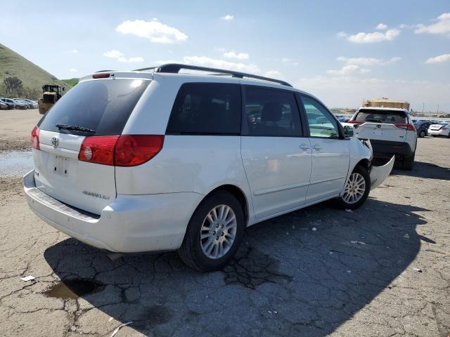 Photo 3 from auction – 2010 TOYOTA SIENNA XLE with VIN 5TDYK4CC7AS293422