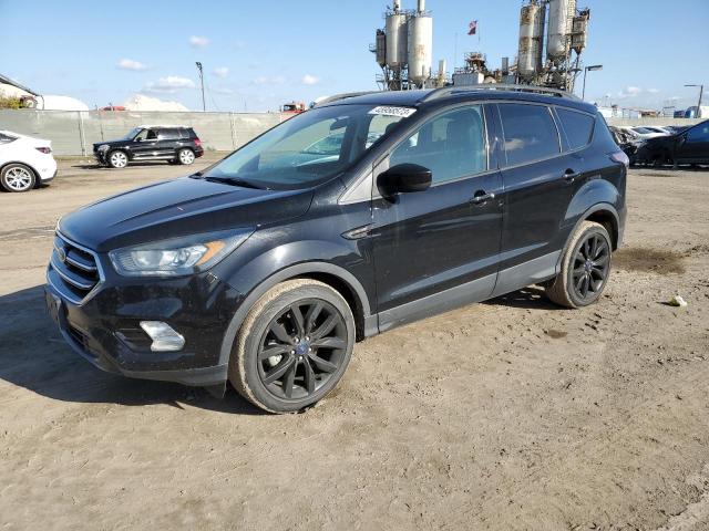 FORD ESCAPE SE 2018 with VIN 1FMCU0GD8JUA97965 - Photo from auction